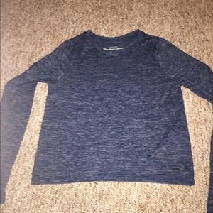 A long sleeve blue shirt